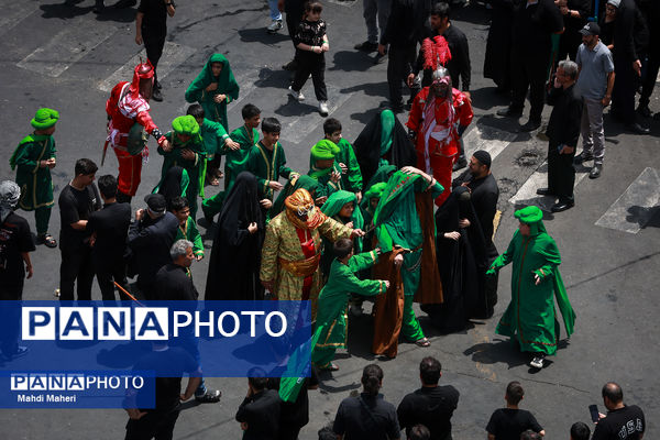 خیمه‌سوزان ظهر عاشورا در چهارراه گلوبندک تهران