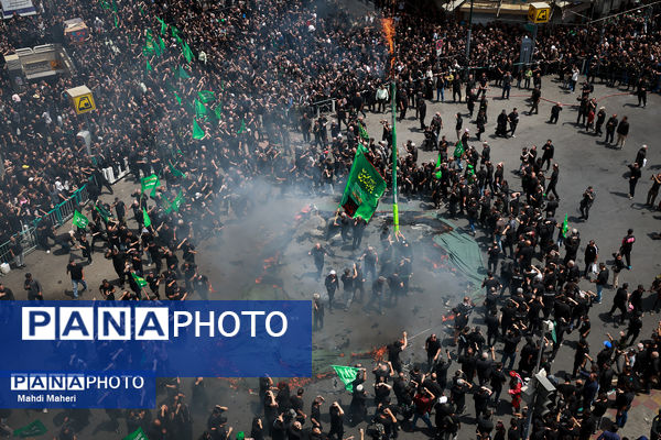 خیمه‌سوزان ظهر عاشورا در چهارراه گلوبندک تهران