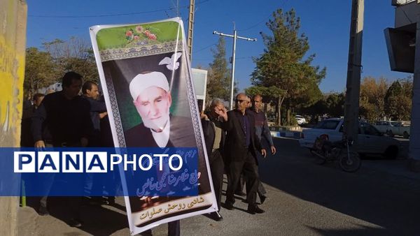 تشییع پیکر و خاکسپاری پدر شهید عجمی فدافن در گلزار شهدای روستای فدافن