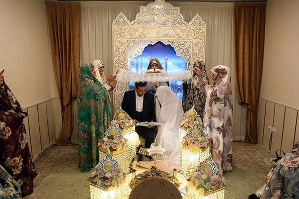 پیوند آسمانی ۲۱۰ زوج جوان همزمان با هفته وحدت در حرم حضرت معصومه(س)