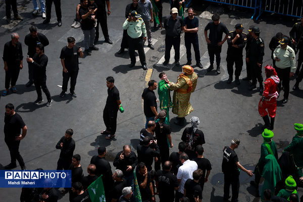خیمه‌سوزان ظهر عاشورا در چهارراه گلوبندک تهران