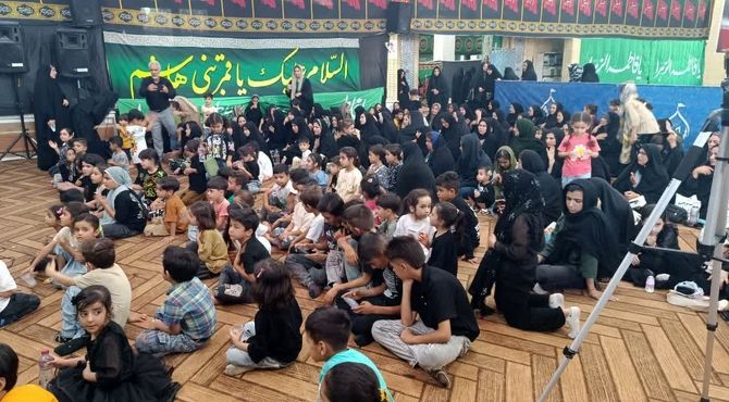 آیین سیاهپوشان کودکان در هیئت رزمندگان اسلام شهرستان خرامه