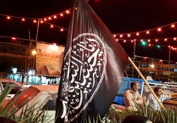 توزیع شربت نذری توسط سازمان دانش آموزی فارس