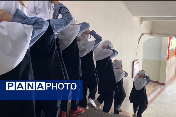 مانور تخلیه اضطراری و آمادگی برای لحظات بحرانی در مدرسه معراج بهارستان‌دو