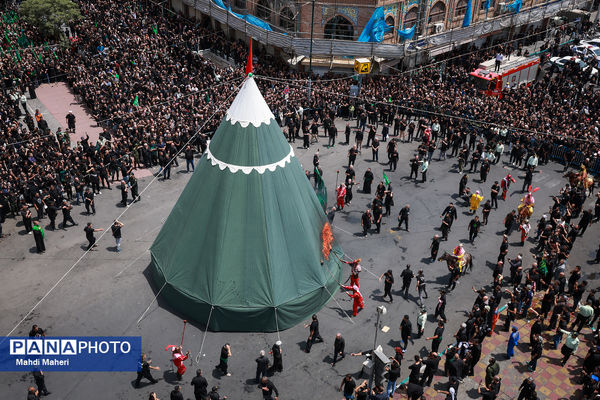 خیمه‌سوزان ظهر عاشورا در چهارراه گلوبندک تهران