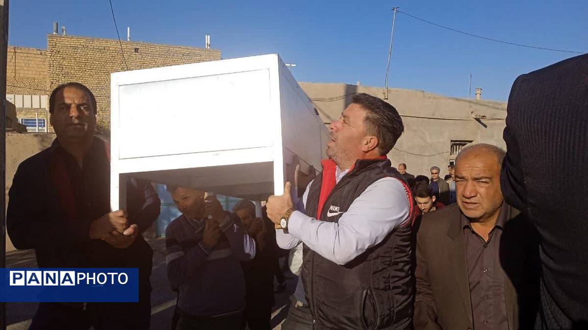 تشییع پیکر و خاکسپاری پدر شهید عجمی فدافن در گلزار شهدای روستای فدافن