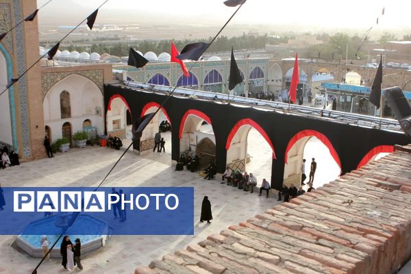 آیین مذهبی تعویض پرچم گنبد حرم مطهر حضرت سلطانعلی ابن امام محمد باقر(ع)
