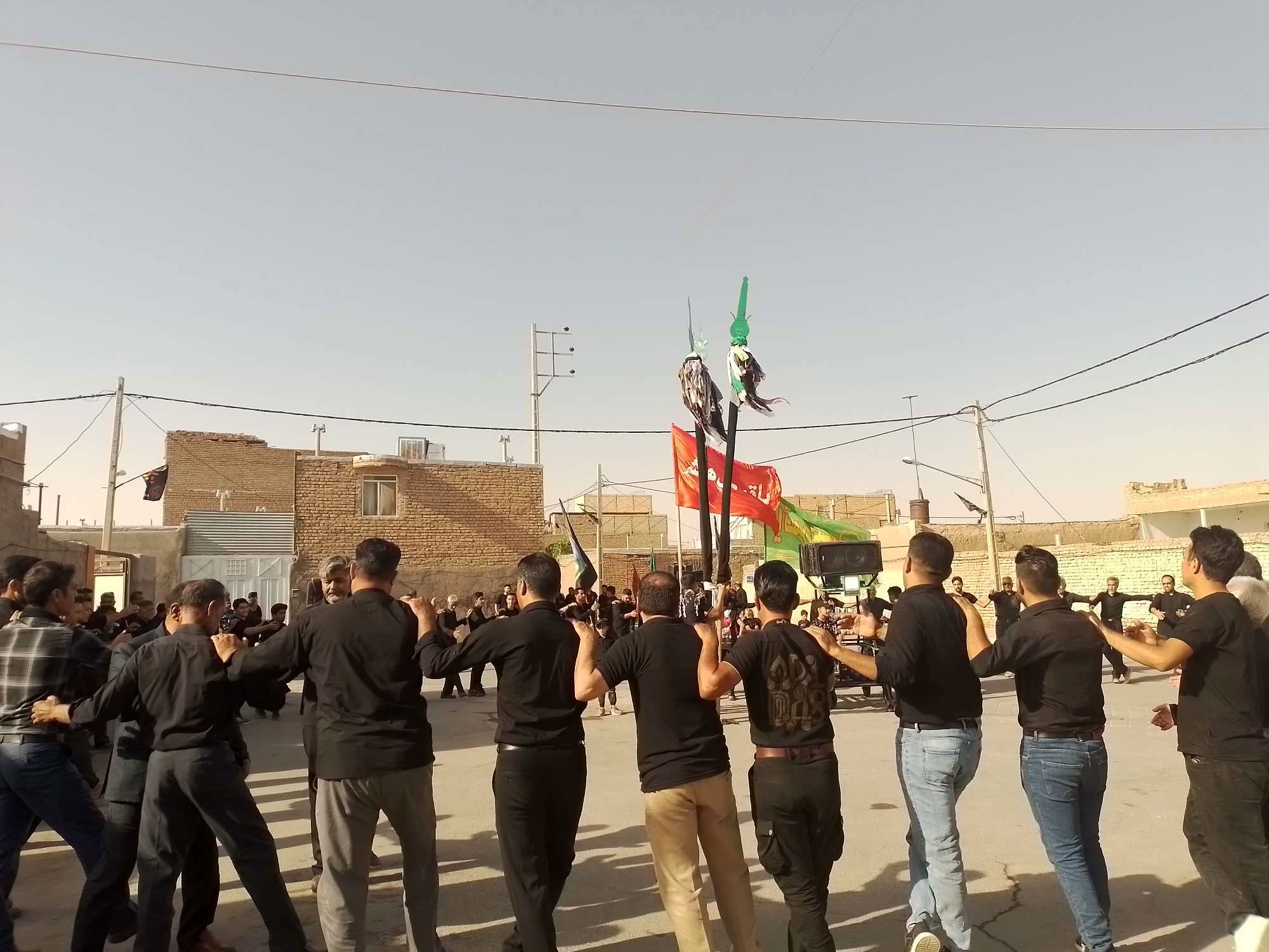 برگزاری مراسم عزاداری سنتی ( حسن - حسین ) در روستای نقاب شهرستان خلیل آباد