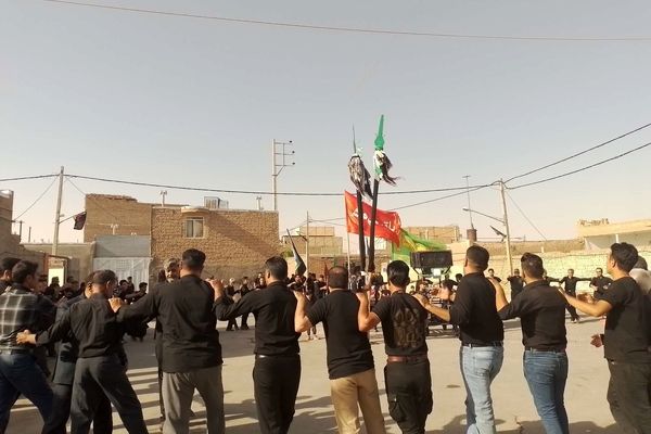 برگزاری مراسم عزاداری سنتی ( حسن - حسین ) در روستای نقاب شهرستان خلیل آباد