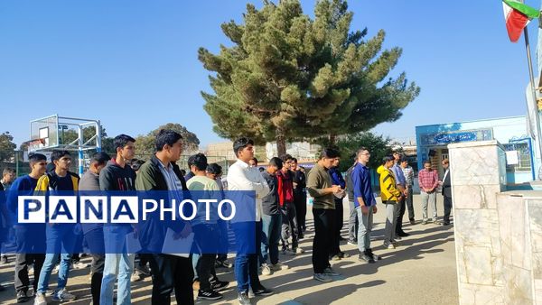 زنگ آغاز هفته بسیج  دانش آموزی در دبیرستان شاهد ابوذر غفاری نیشابور 