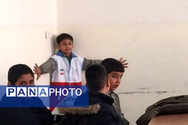آموزش شرایط اضطراری و پناهگیری در دبستان باقرالعلوم فیروزکوه
