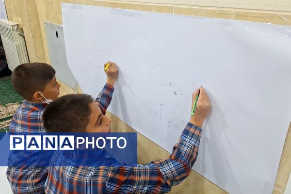 برپایی نقاشی همگانی در هفته ماها در آموزشگاه معارف۶ ناحیه ۳شیراز 