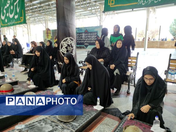 غبارروبی و گلباران مزار شهدای ملارد در رزمایش بزرگ بیت‌المقدس بسیجیان
