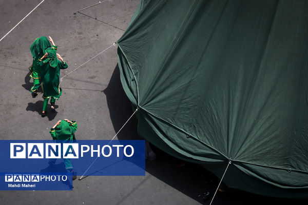 خیمه‌سوزان ظهر عاشورا در چهارراه گلوبندک تهران