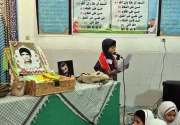 برپایی محفل انس با قرآن به یاد شهید محمد حسین فلاح حسینی در دبستان علمدار تفت