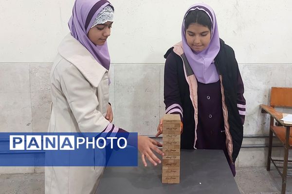 تصاویری زیبا از تمرکز دانش‌آموزان دختر در المپیاد رویش ناحیه۳ شیراز 
