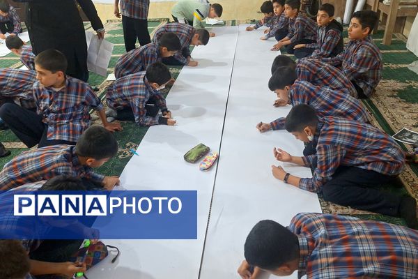 برپایی نقاشی همگانی در هفته ماها در آموزشگاه معارف۶ ناحیه ۳شیراز 