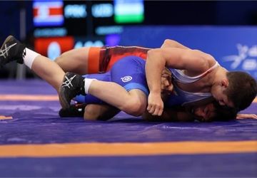 بازی‌های آسیایی جوانان‌؛ کشتی‌گیر ایران شکست خورد و راهی رده‌بندی شد