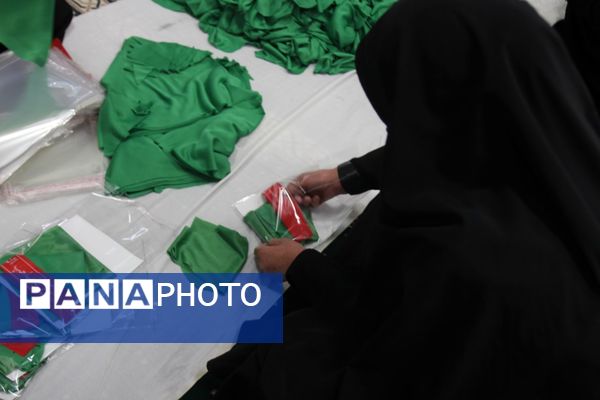بسته‌بندی لباس همایش شیرخوارگان حسینی زنجان