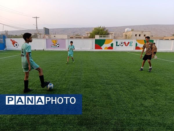 افتتاح زمین چمن مصنوعی آموزشگاه شهید مطهری مارم در فین