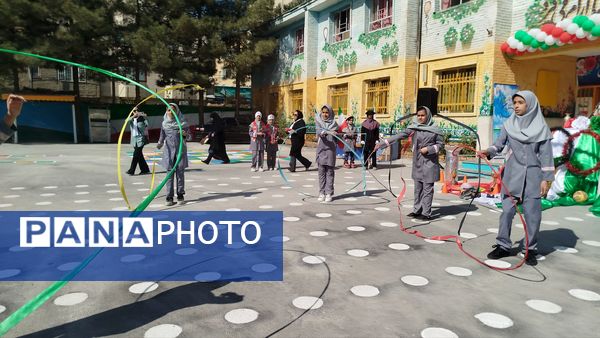 مشعل المپیاد ورزشی ناحیه ۷ در دبستان شهدای راه آهن روشن شد