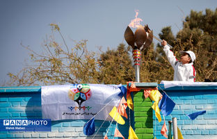 مشعل المپیاد ورزشی درون‌مدرسه‌ای با دستان فرزند شهید جنگ ۱۲ روزه روشن شد