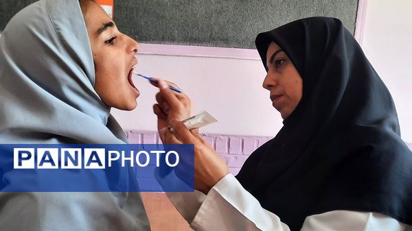 اجرای طرح وارنیش فلوراید در دبستان پنجم مهر
