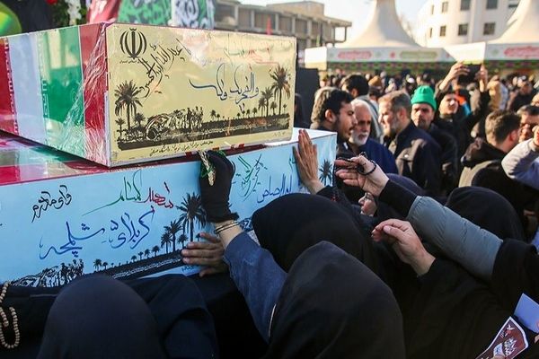 بدرقه پیکر مطهر ۱۳ شهید گمنام در اجتماع عظیم فاطمیون مشهد