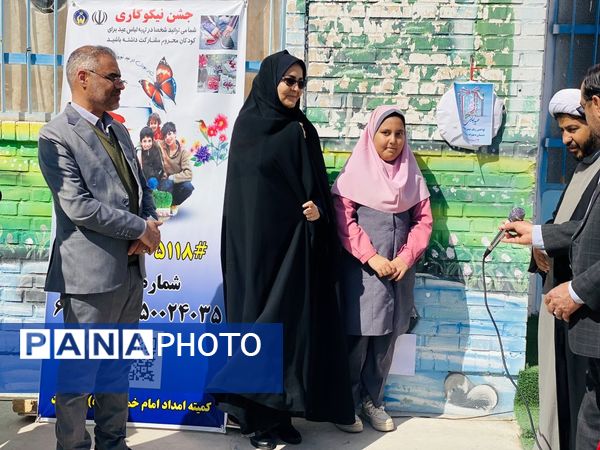 نواختن زنگ جشن نیکوکاری در دبستان زینب قهرمانی مه ولات