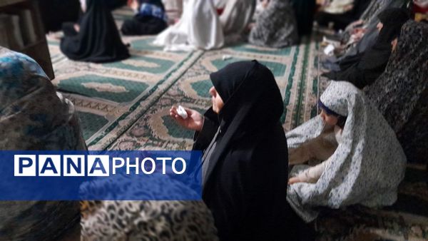 پرچم حرم حضرت عباس(ع) در مراسم اعتکاف شهرستان بن