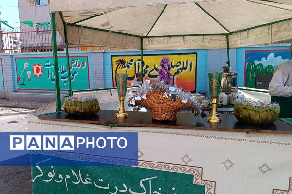 مراسم  پرچم گردانی  بارگاه حضرت علی بن موسی‌الرضا (ع) در مدرسه باهنر ملارد به مناسبت دهه کرامت