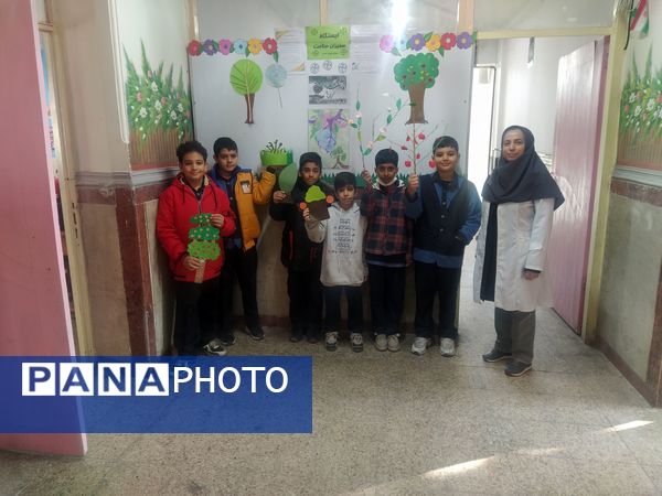 مشارکت دانش‌آموزان در فعالیت درختکاری دبستان شهدای گمنام۲